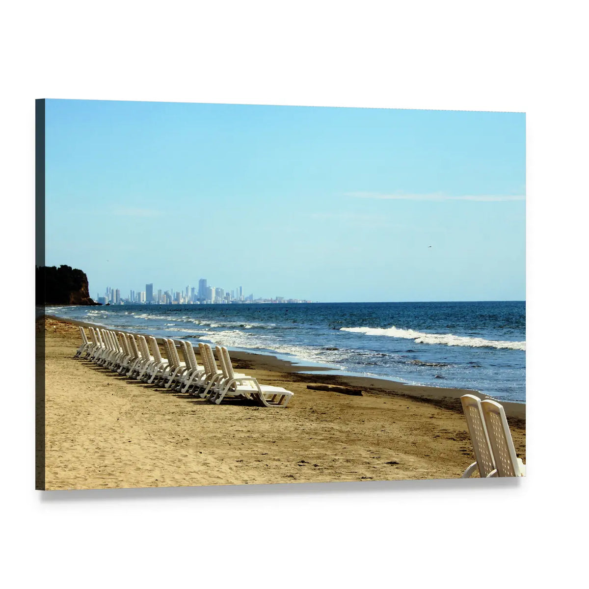 Lounge Chairs on Beach with City Skyline Canvas Wall Art, single panel gallery wrapped canvas, angled product view