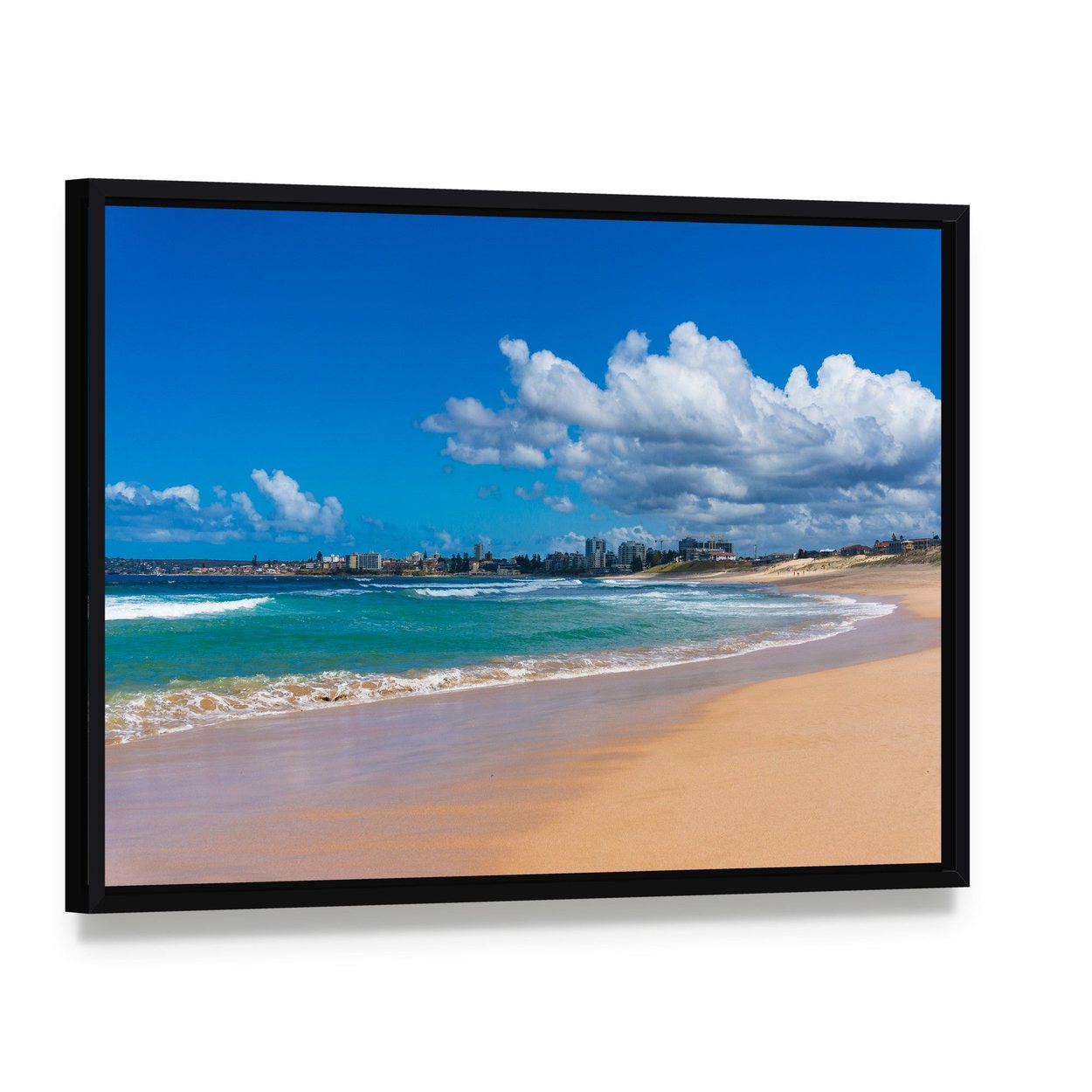 Cronulla Coastline Canvas Wall Art, framed canvas in a black floater frame, angled product view