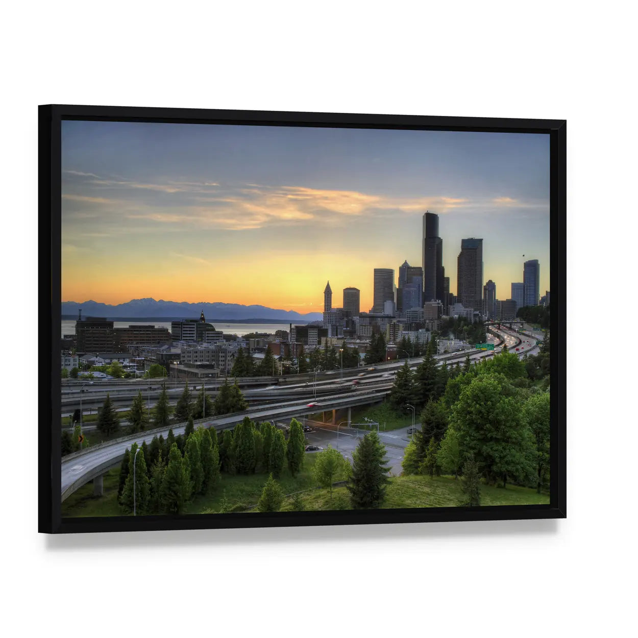 Seattle Skyline with Mountains at Sunset Canvas Wall Art, framed canvas in a black floater frame, angled product view