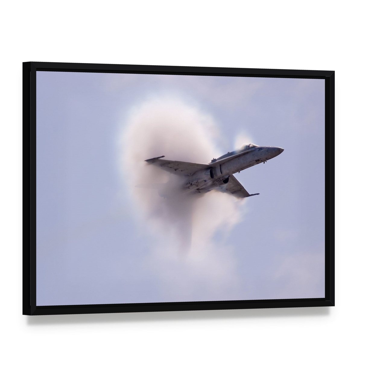 Supersonic Fighter Jet with Vapor Cone Canvas Wall Art, framed canvas in a black floater frame, angled product view