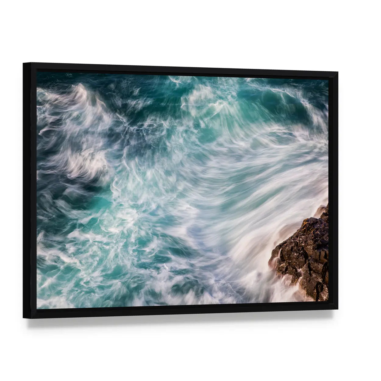 Ocean Waves Abstract Canvas Wall Art, framed canvas in a black floater frame, angled product view