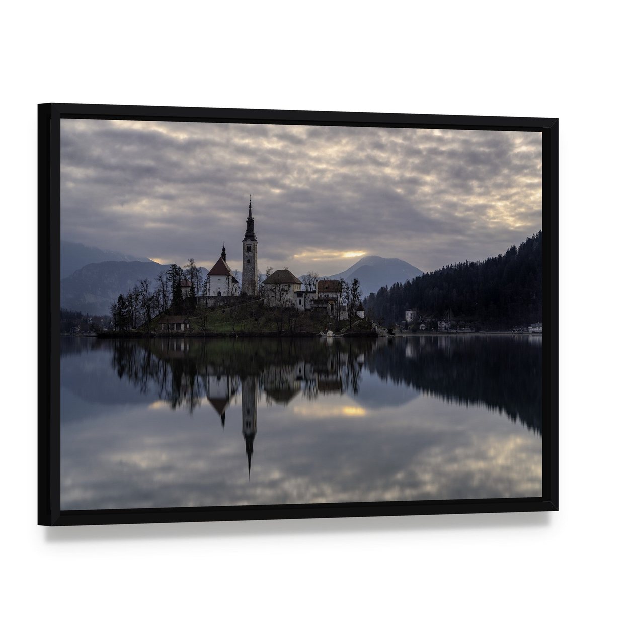Glacial Lake Bled Reflection Canvas Wall Art, framed canvas in a black floater frame, angled product view