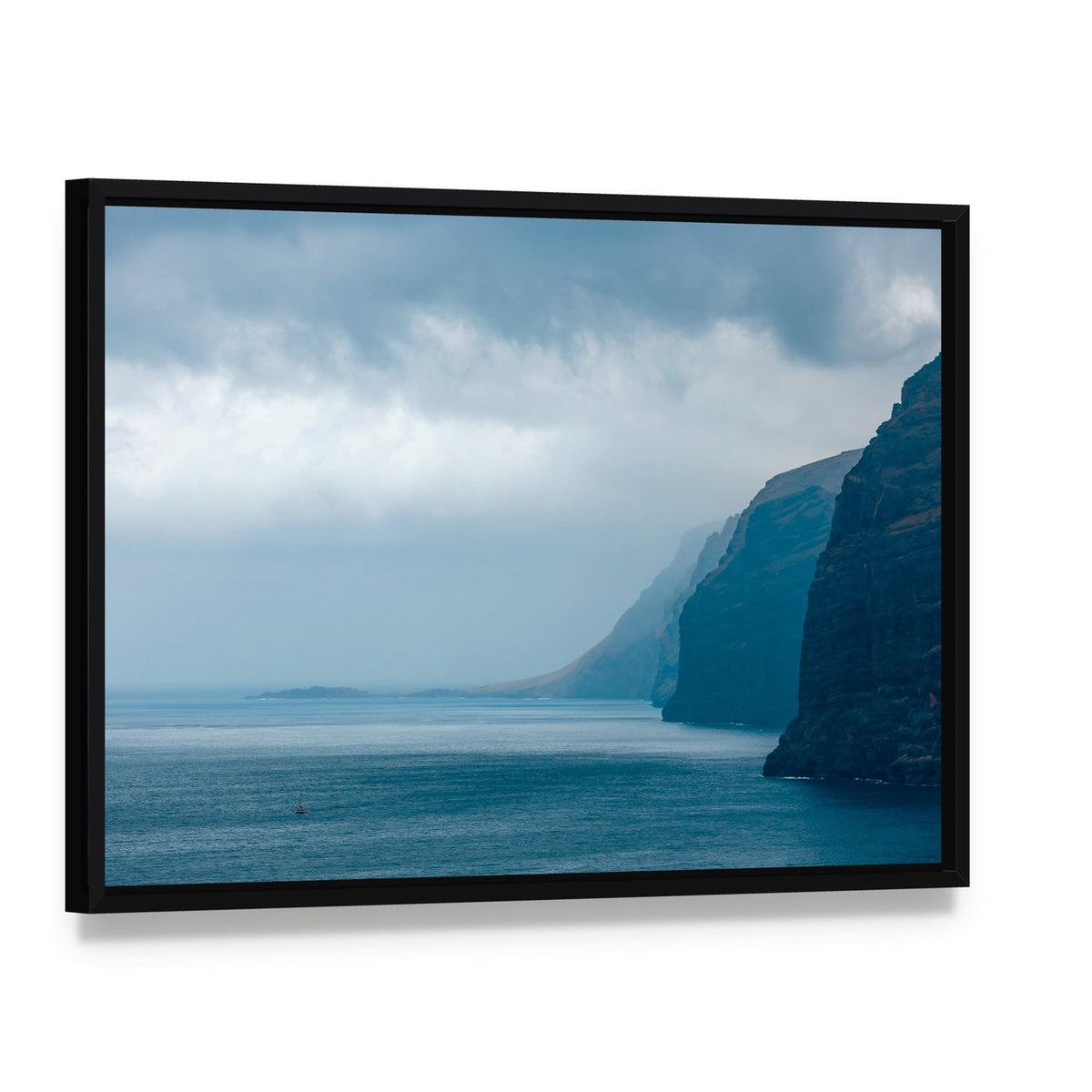 Cloudy Cliffs of Los Gigantes Canvas Wall Art, framed canvas in a black floater frame, angled product view
