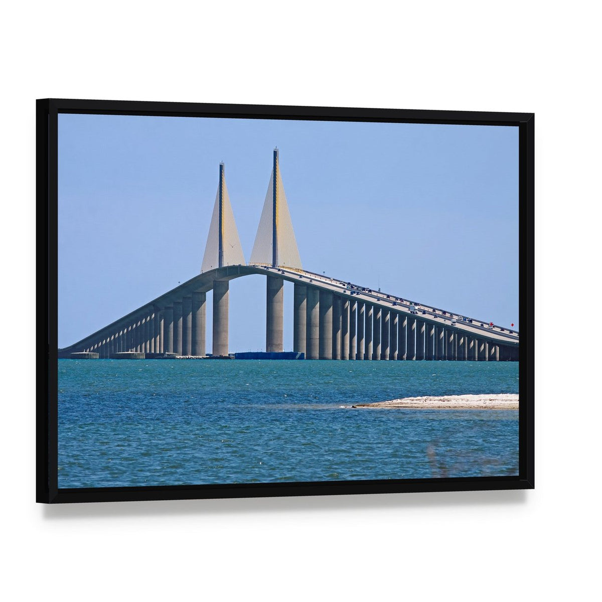 Sunshine Skyway Bridge Canvas Wall Art, framed canvas in a black floater frame, angled product view