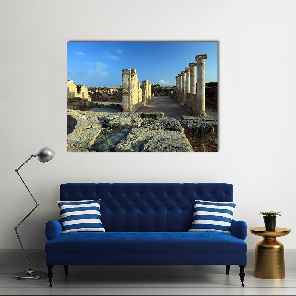 Temple Columns in Paphos Canvas Wall Art in beige, brown and blue, single panel hung on a wall
