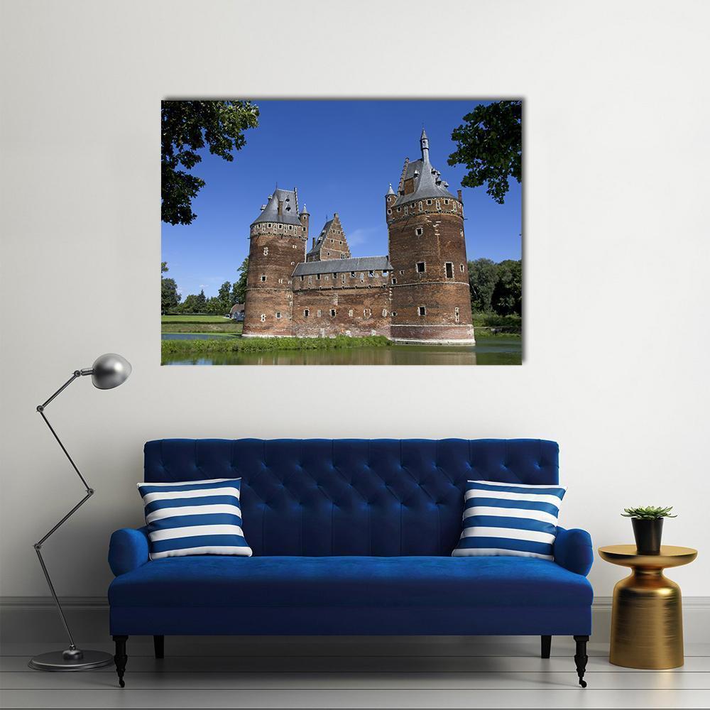 Beersel Castle Canvas Wall Art in brown, green and blue, single panel hung on a wall