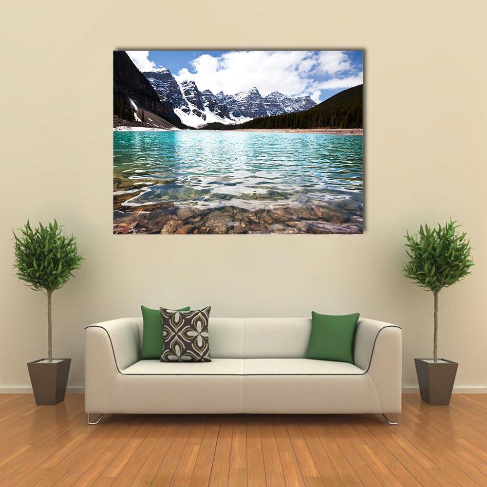 Turquoise Lake in Canada with Snow-capped Peaks Canvas Wall Art in white, gray and blue, single panel hung on a wall