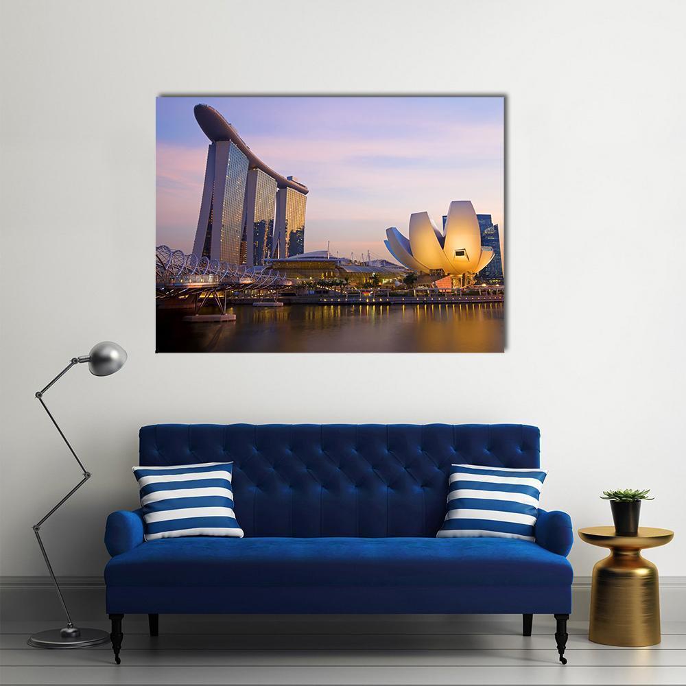Marina Bay Singapore Skyline Canvas Wall Art in yellow, blue and purple, single panel hung on a wall