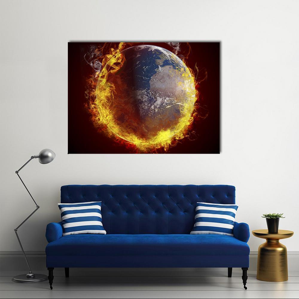 Burning Planet Earth Canvas Wall Art in black, orange and yellow, single panel hung on a wall