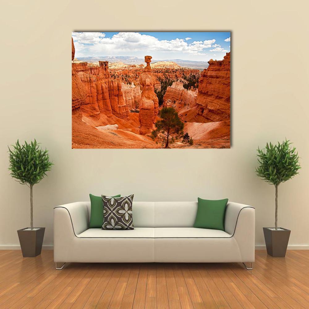 Thor's Hammer Hoodoo at Bryce Canyon Canvas Wall Art in brown, orange and blue, single panel hung on a wall