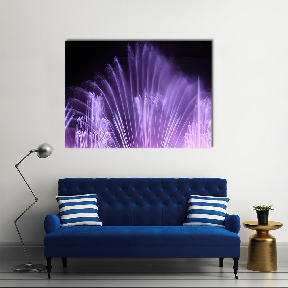Purple Dancing Fountains Canvas Wall Art in black and purple, single panel hung on a wall