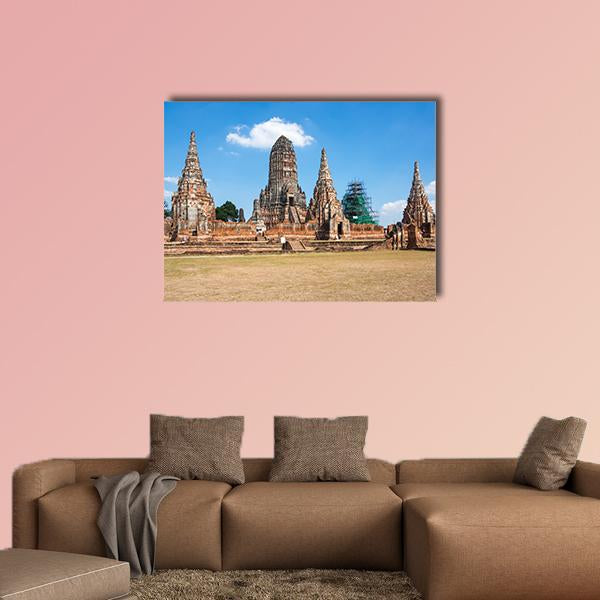 Ayutthaya Temple Ruins Canvas Wall Art in beige, brown and blue, single panel hung on a wall