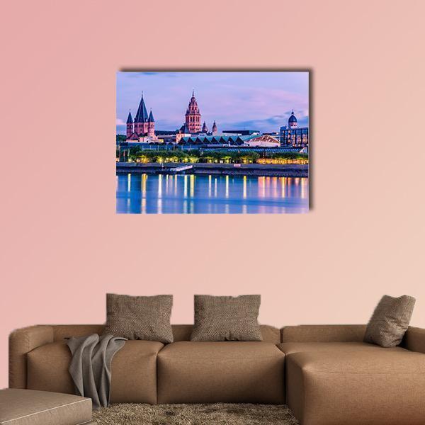 Mainz Cityscape Canvas Wall Art in blue, purple and pink, single panel hung on a wall