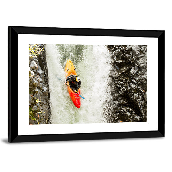 Adventurous Kayaker Navigating Waterfall Canvas Wall Art