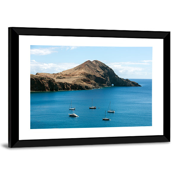 Rocky Island with Anchored Sailboats Canvas Wall Art