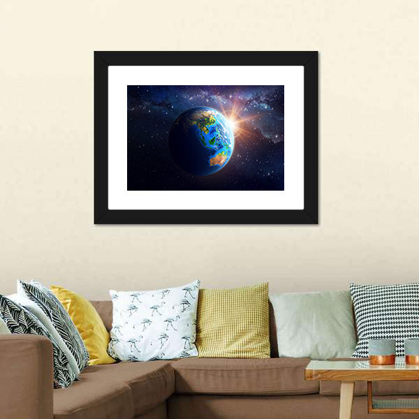 Illuminated Face Of The Earth In Space Canvas Wall Art