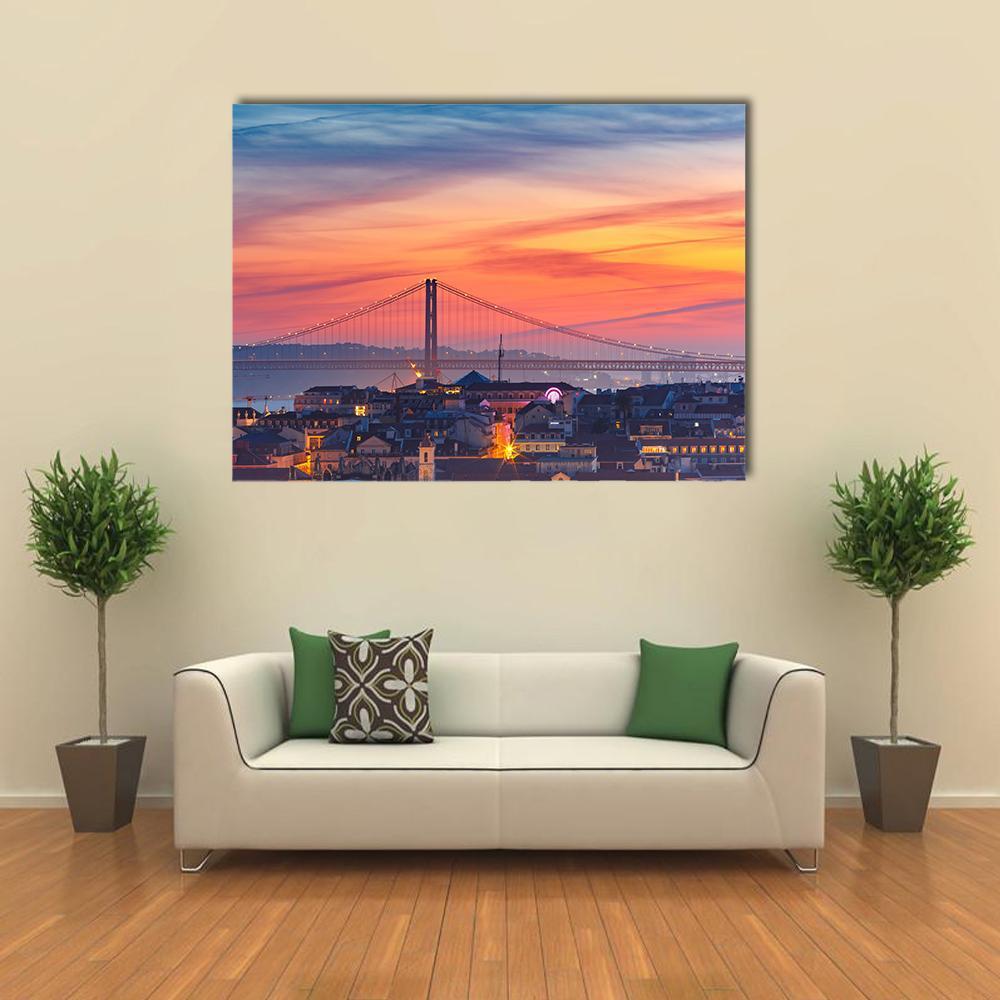 25 De Abril Bridge at Sunset Canvas Wall Art in orange, blue and pink, single panel hung on a wall