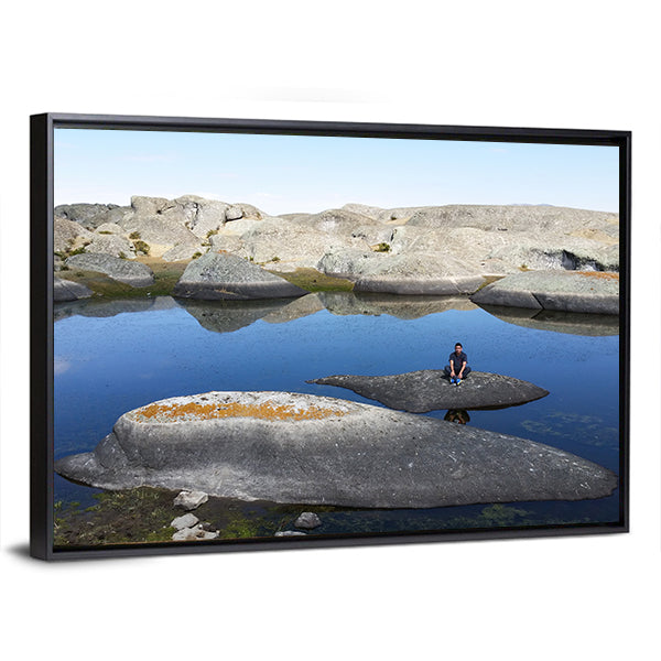 Marcahuasi Lake with Figure on Rock Canvas Wall Art