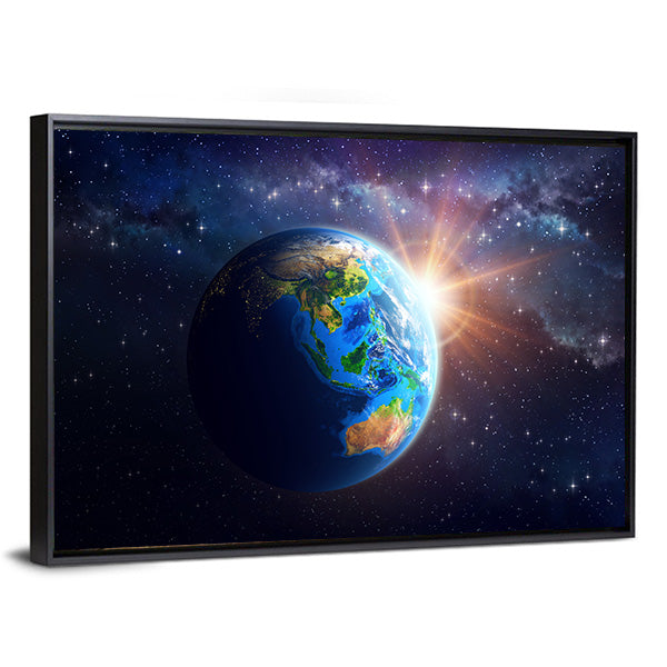 Illuminated Face Of The Earth In Space Canvas Wall Art