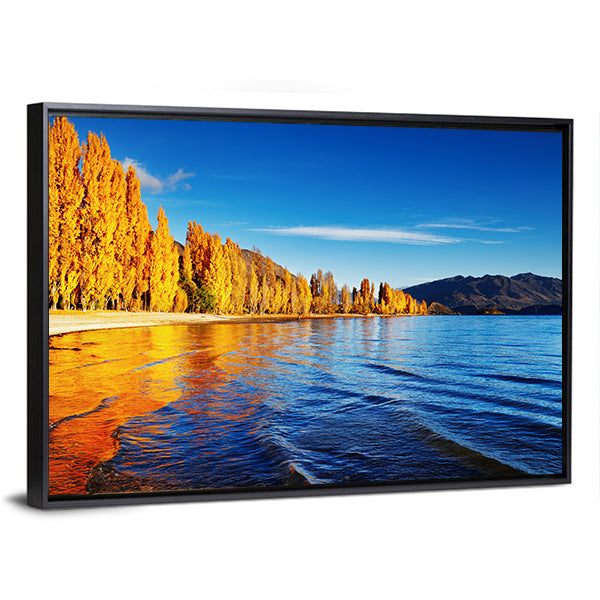 Lake Wanaka Golden Autumn Reflection Canvas Wall Art in orange, yellow and blue, framed canvas, product view on a white background