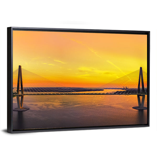 Charleston Bridge at Sunset Canvas Wall Art in orange, yellow and blue, framed canvas, product view on a white background
