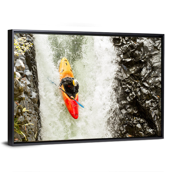 Adventurous Kayaker Navigating Waterfall Canvas Wall Art