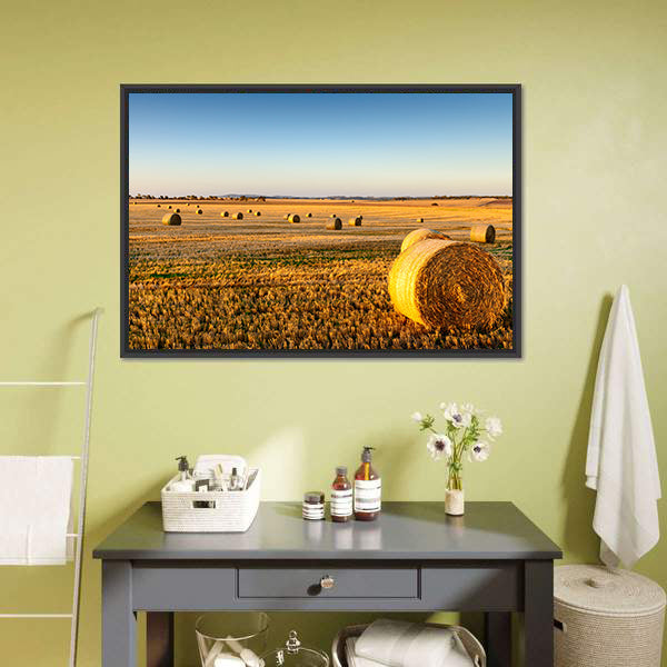 Sunset Hay Bales in Field Canvas Wall Art