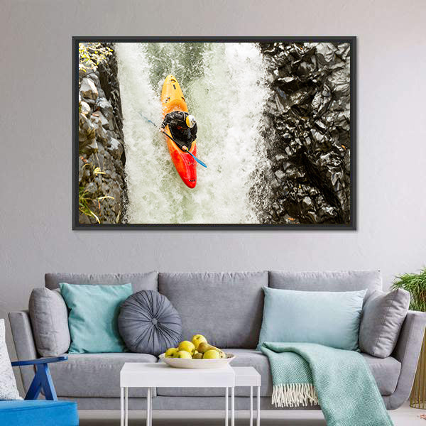 Adventurous Kayaker Navigating Waterfall Canvas Wall Art
