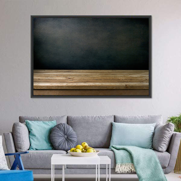 Wooden Table Against Grunge Black Canvas Wall Art