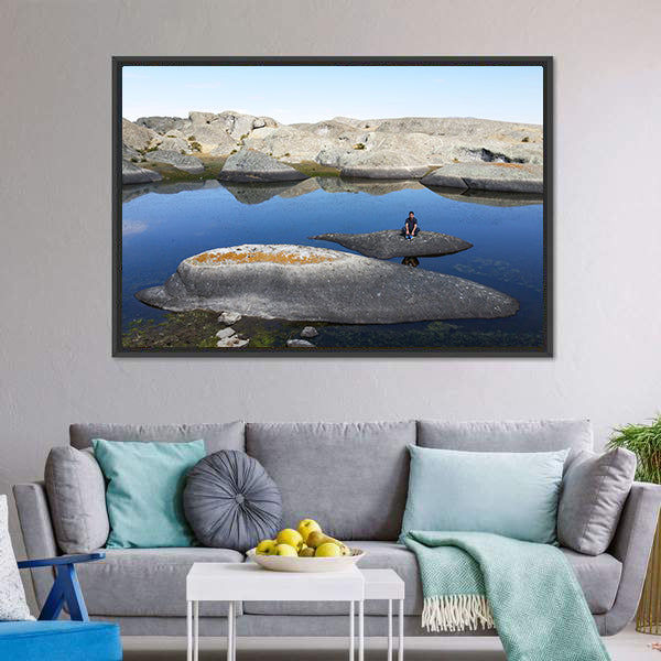 Marcahuasi Lake with Figure on Rock Canvas Wall Art