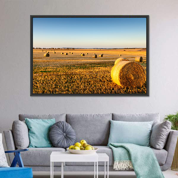Sunset Hay Bales in Field Canvas Wall Art