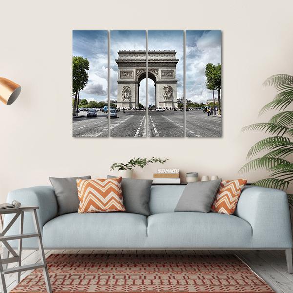 Arc De Triomphe on Paris Avenue Canvas Wall Art in white, gray and blue, hung on a wall