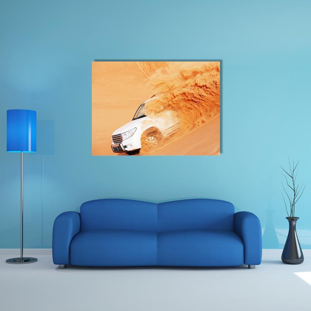 White Suv Kicking Up Sand Canvas Wall Art in white, beige and orange, single panel hung on a wall