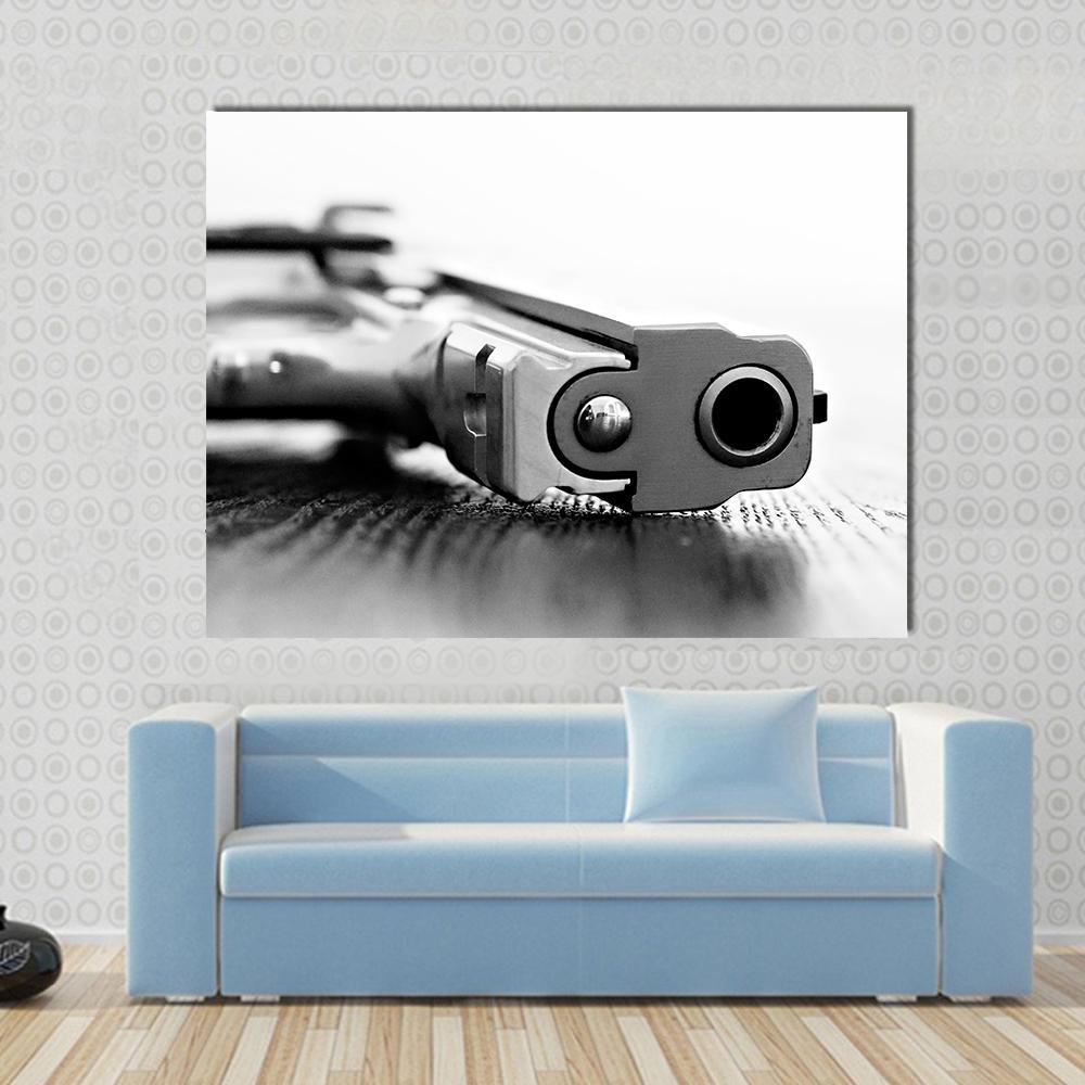9mm Gun Canvas Wall Art in black, white and gray, single panel hung on a wall