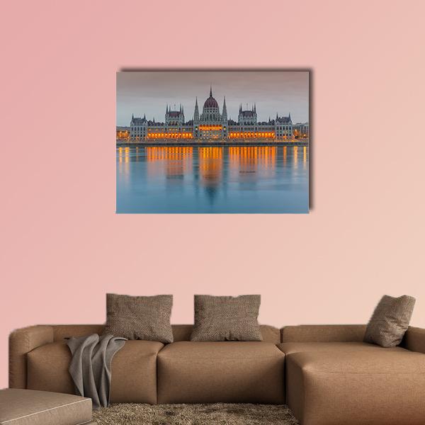 Budapest Parliament at Dusk Canvas Wall Art in gray, orange and blue, single panel hung on a wall