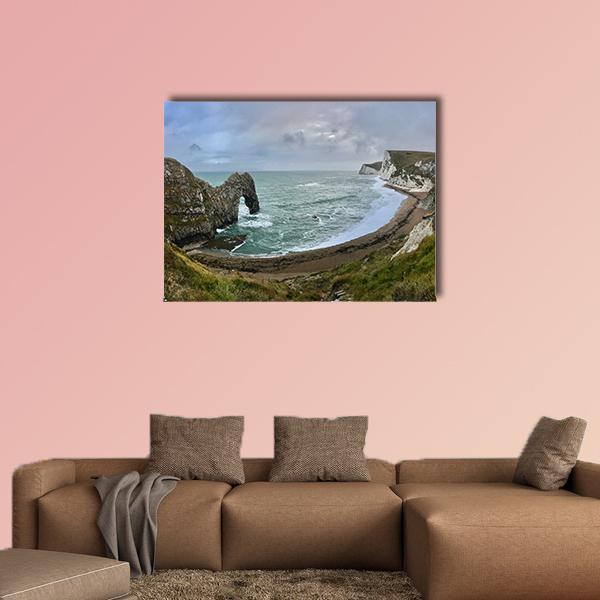 Durdle Door Beach Canvas Wall Art in gray, green and blue, single panel hung on a wall