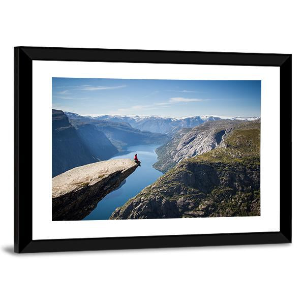Man Sitting On Trolltunga Canvas Wall Art-1 Piece-Framed Print-20" x 16"-Tiaracle