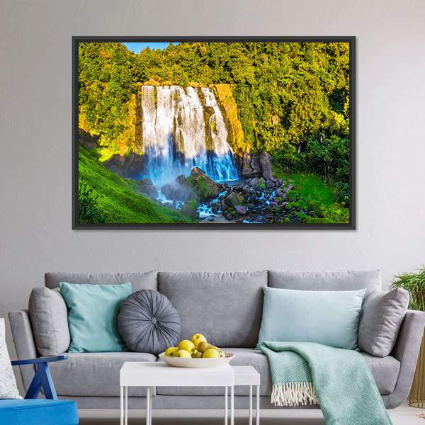 Marokopa Falls Over Forested Rocks Canvas Wall Art in white, brown and green, framed canvas, product view on a white background