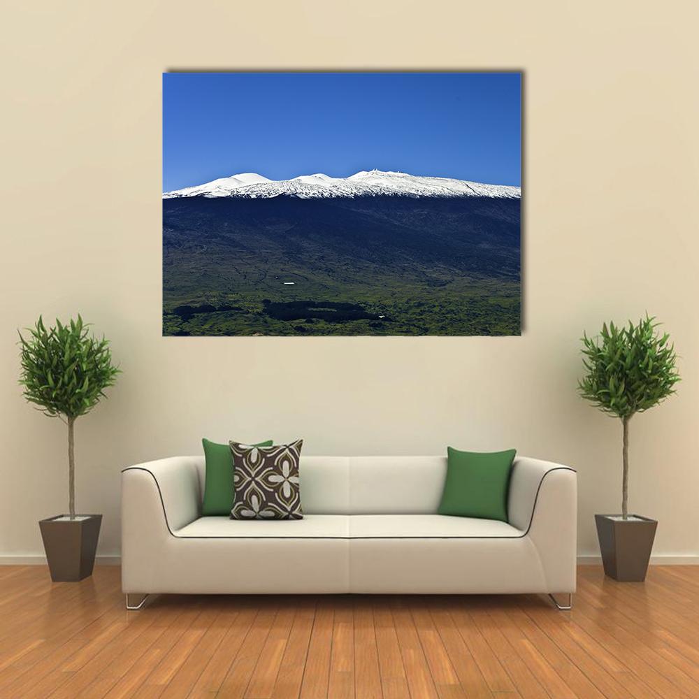 Mauna Kea Covered in Snow Canvas Wall Art in black, white and blue, single panel hung on a wall
