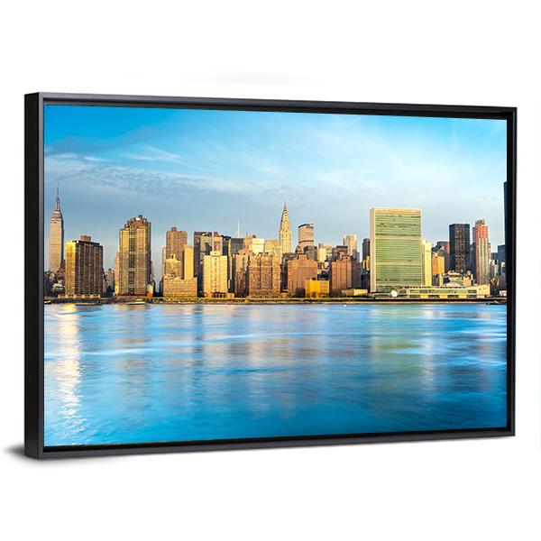 Midtown Manhattan Skyline Canvas Wall Art in gold, yellow and blue, framed canvas, product view on a white background