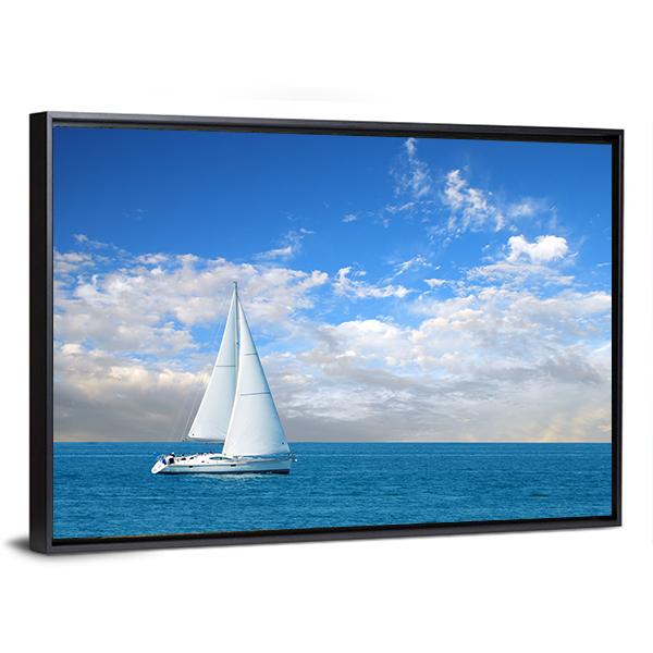 Modern Sail Boat Canvas Wall Art in white and blue, framed canvas, product view on a white background