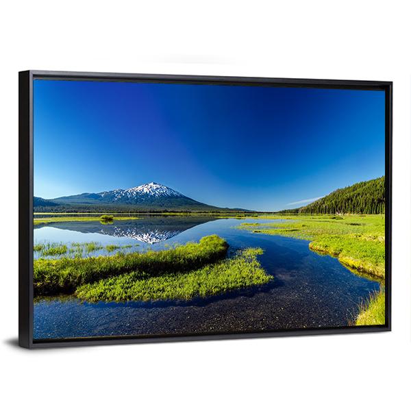 Mount Bachelor Reflected in Lake Canvas Wall Art in green and blue, framed canvas, product view on a white background