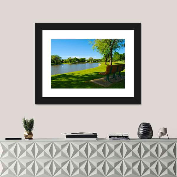 Park Bench Overlooking A Lake Canvas Wall Art-1 Piece-Framed Print-20" x 16"-Tiaracle