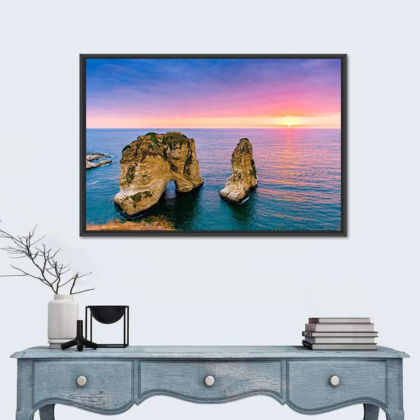 Pigeons on Coastal Rock at Sunset Canvas Wall Art in orange, blue and pink, framed canvas, product view on a white background