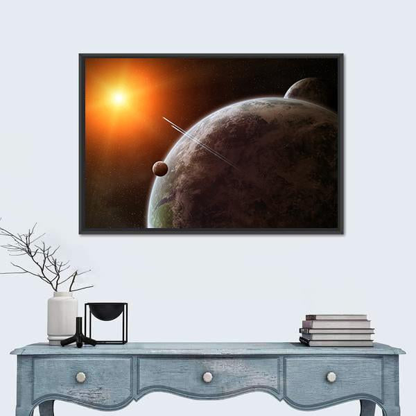 Planet with Moon Orbiting Star Canvas Wall Art in black, gray and orange, framed canvas, product view on a white background
