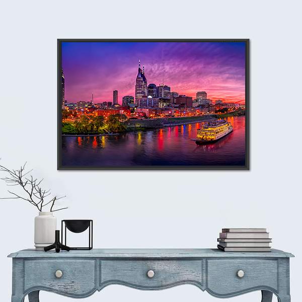 Nashville Skyline at Sunset with Paddlewheel Boat Canvas Wall Art in blue, purple and pink, framed canvas, product view on a white background