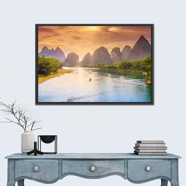 Guilin Karst River at Sunset Canvas Wall Art in orange, yellow and blue, framed canvas, product view on a white background