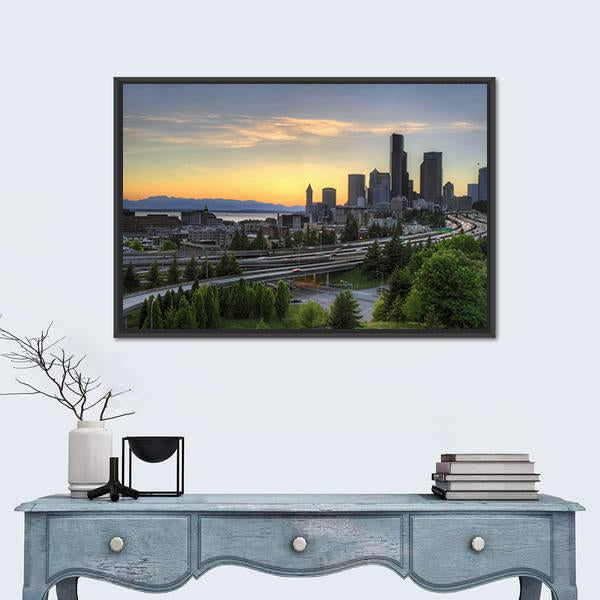 Seattle Skyline with Mountains at Sunset Canvas Wall Art in orange, green and blue, framed canvas, product view on a white background