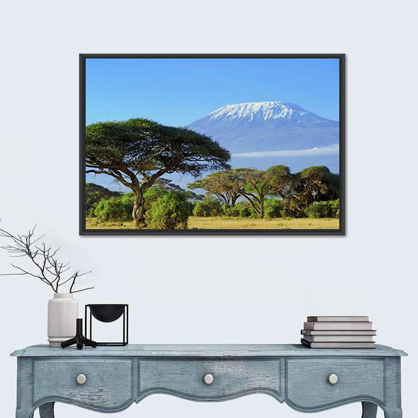 Snow-capped Mount Kilimanjaro Canvas Wall Art in white, green and blue, framed canvas, product view on a white background