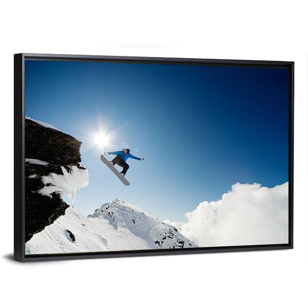Snowboarder Jumping Through Air After Rock Drop Canvas Wall Art-5 Horizontal-Gallery Wrap-22" x 12"-Tiaracle